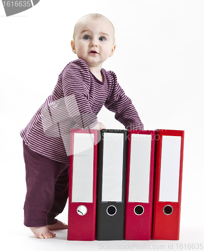 Image of young child with ring file