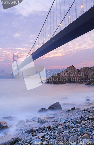 Image of long bridge in sunset hour