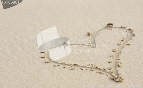 Image of Heart drawn on sand