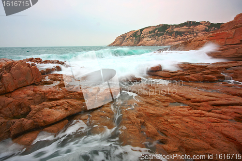 Image of rocky sea coast and blurred water in shek o,hong kong 