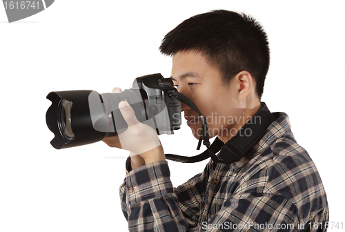 Image of Male photographer holding camera