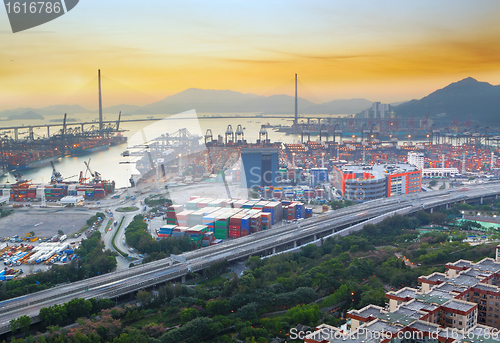 Image of sunset in cargo container terminal