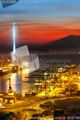 Image of sunset in cargo container terminal