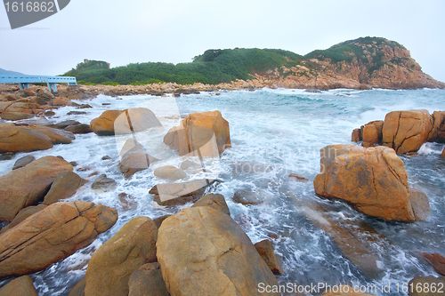 Image of rocky sea coast and blurred water in shek o,hong kong 