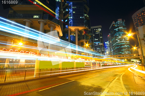 Image of Traffic at night with traces of lights left by the cars on a hig