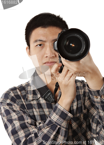 Image of Male photographer holding camera