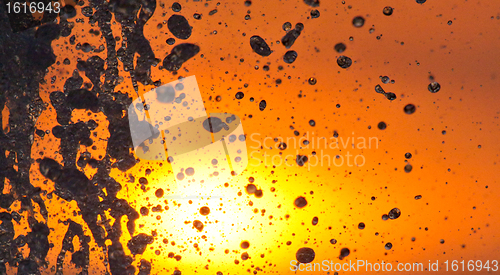 Image of A fountain in the sunset