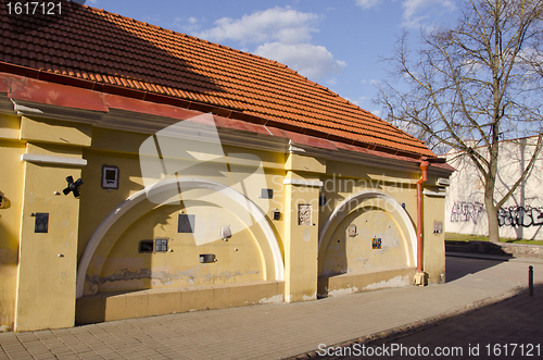 Image of Ancient architecture old town building yellow wall 