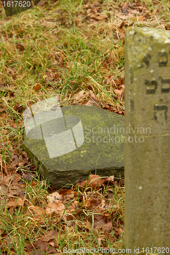 Image of A broken gravestone