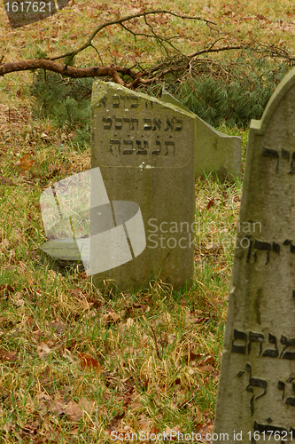 Image of A broken gravestone