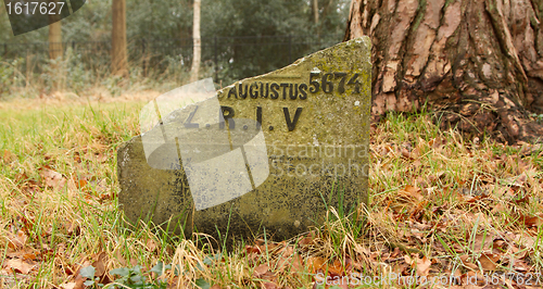 Image of A broken gravestone