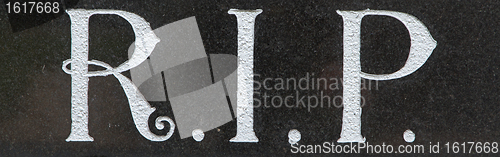 Image of The letter RIP on a grave