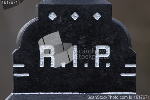 Image of The letter RIP on a grave