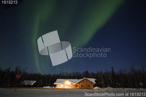 Image of Northern Lights over house in southcentral Alaska