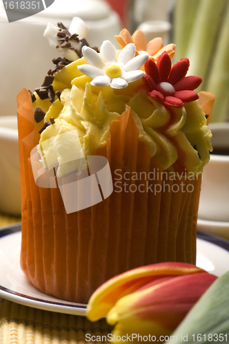 Image of Spring muffins decorated with flower petals with tulips 