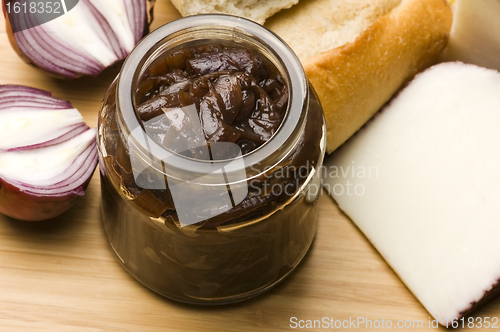 Image of Onion jam in jar, goat's cheese and fresh bread