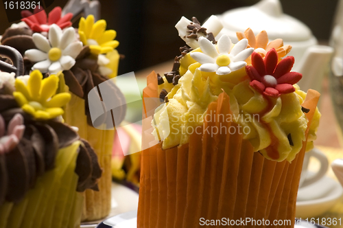 Image of Spring muffins decorated with flower petals with tulips 
