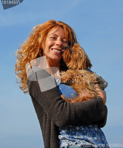 Image of woman and little dog