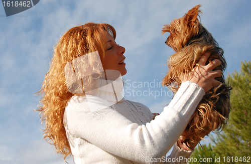 Image of woman and little dog