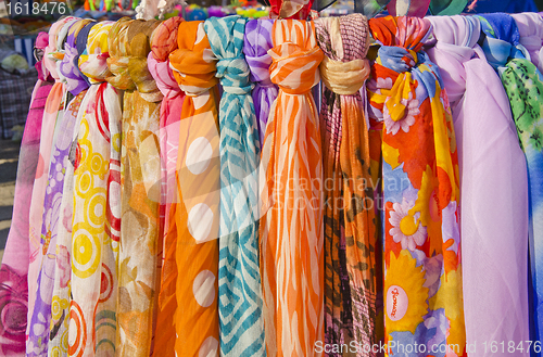 Image of Multicolor shawls and scarves.