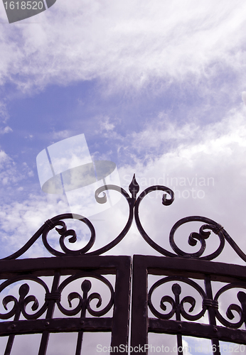 Image of Sky view through gates.