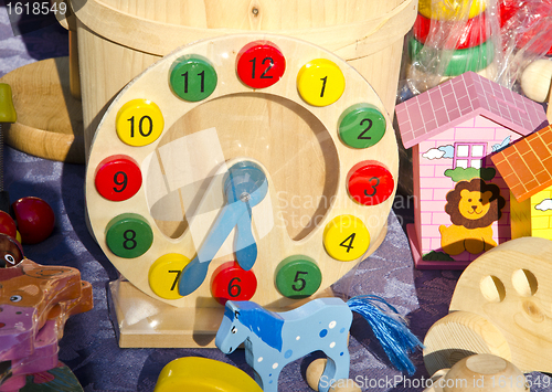 Image of Playgrounds wooden toys Clock imitation horses 