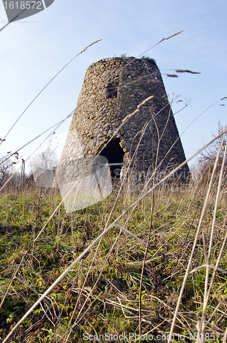 Image of Ancient abandoned windmill built stones nostalgia 