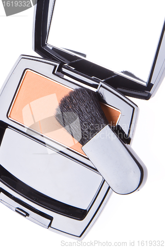 Image of compact blush with brush
