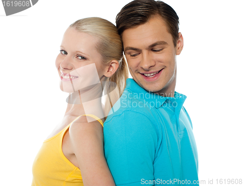 Image of Closeup shot of a young couple, back to back