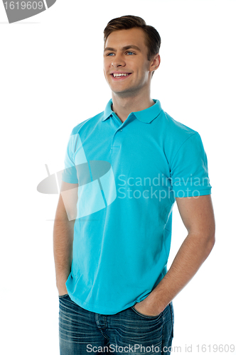 Image of Handsome young guy, relaxed and smiling