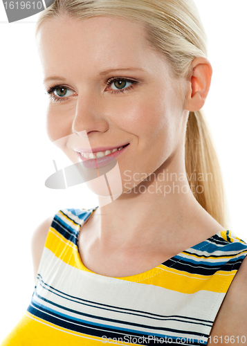 Image of Closeup shot of blond girl looking away