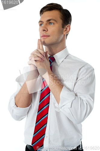 Image of Mature male executive thinking