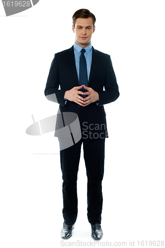 Image of Smiling young confident executive