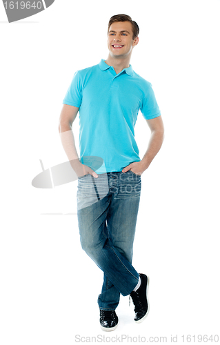 Image of Full-body pose of smiling man
