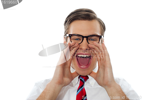 Image of Closeup shot of a young man shouting loud