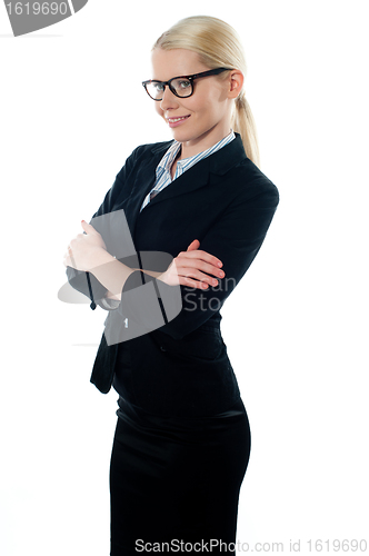 Image of Side view of pretty young female executive