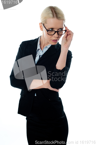 Image of Full view of attractive businesswoman looking away