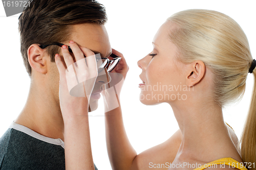 Image of Beautiful girl about to kiss her boyfriend