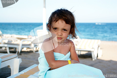 Image of The girl on sea coast