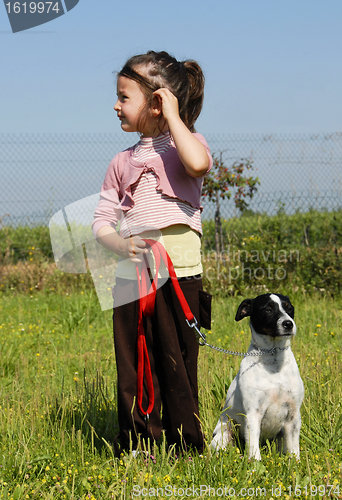 Image of little girl and dog