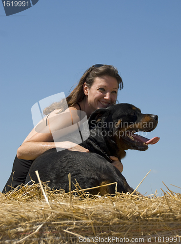 Image of woman and rottweiler