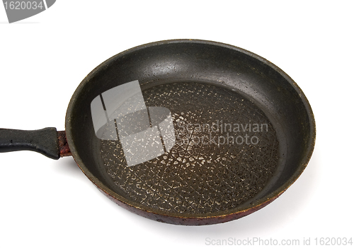 Image of Dirty old frying pan on white background