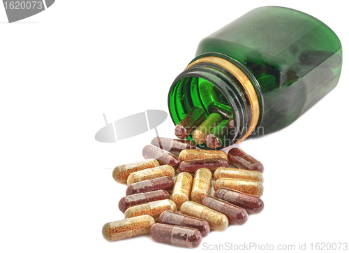Image of Capsules Pills Medicine with green bottle