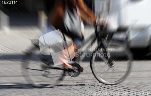 Image of biking woman