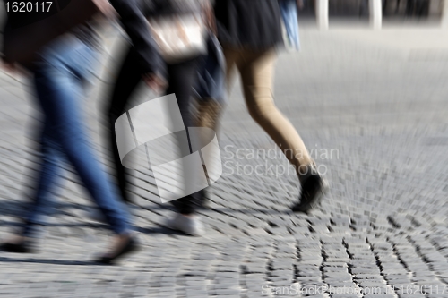 Image of walking woman