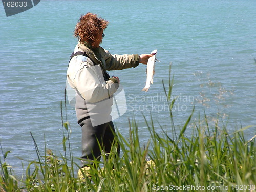 Image of Proud fisherman