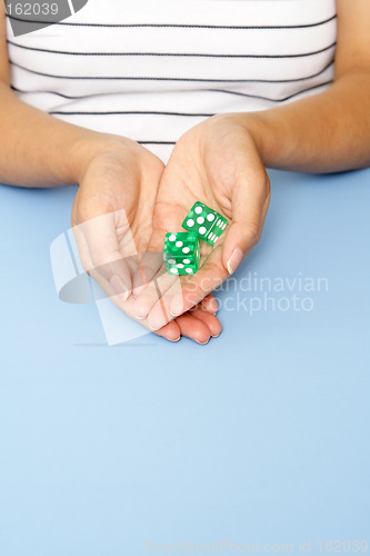 Image of Holding dice
