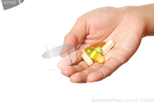 Image of Holding vitamins