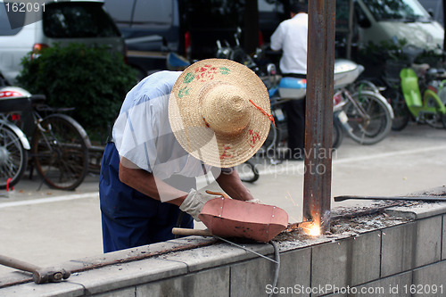 Image of Chinese worker
