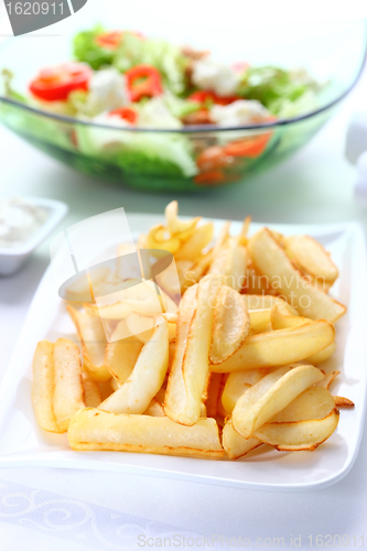 Image of Baked potatoes with dip and vegetable salad